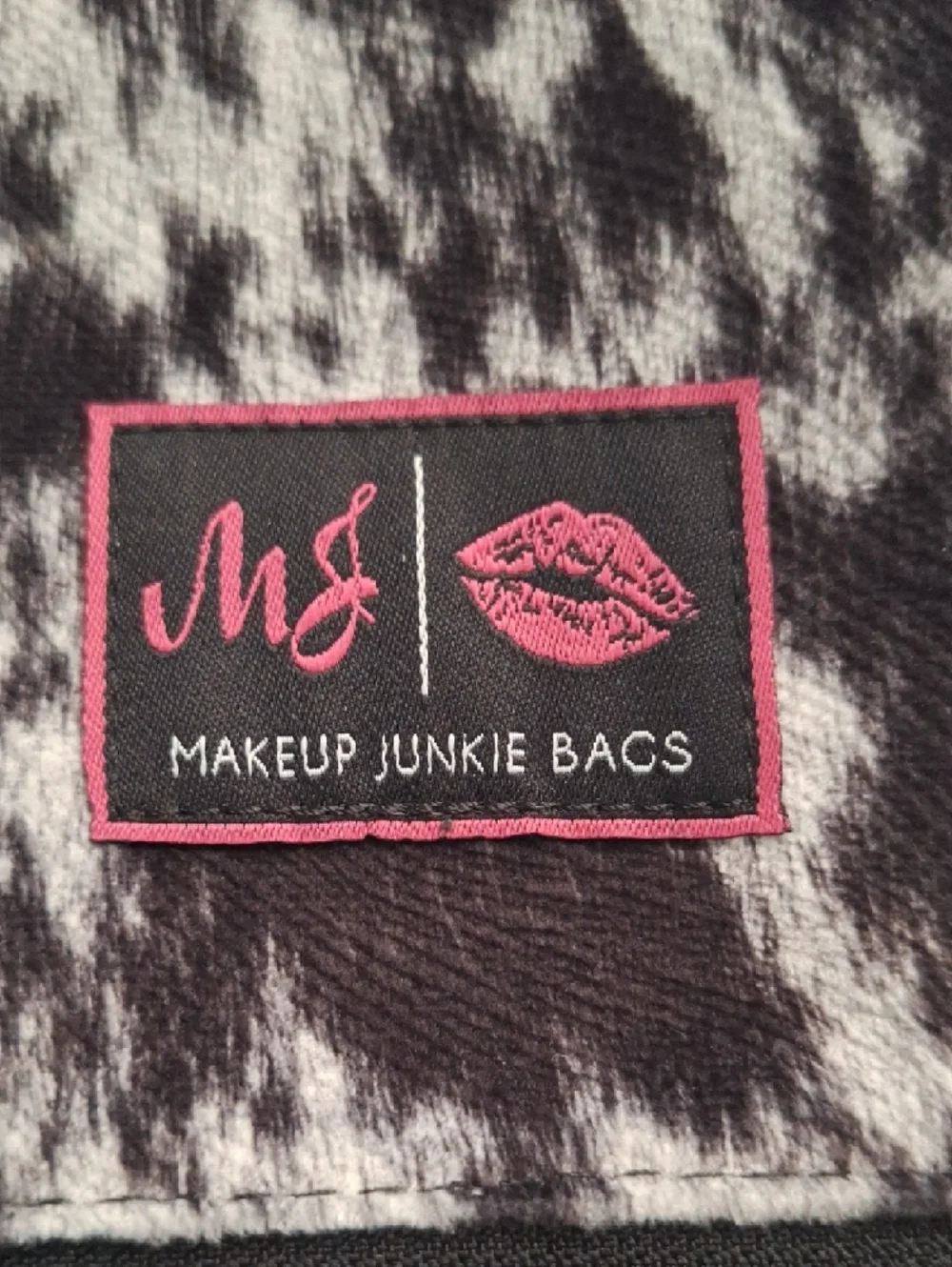Makeup JUNKIE Black & White Cowhide Bag with Tassel - Picture 2 of 4